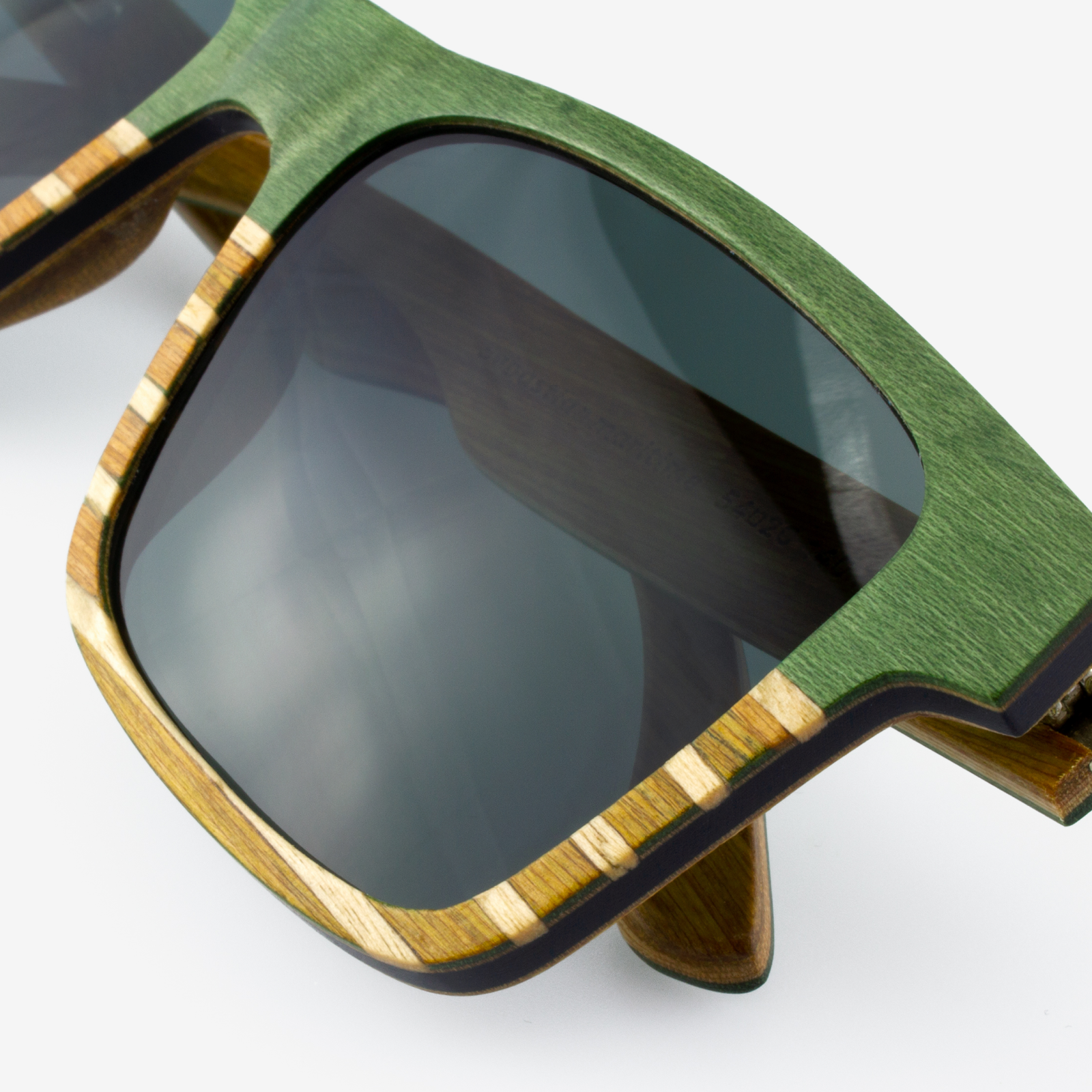 Sebastian Maritime Special Edition sunglasses with green maple, teak, and ash layers forming Tommy Owens signature strip pattern