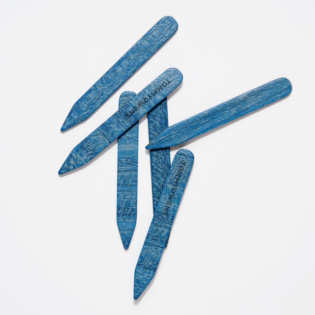 Rare blue maple collar stays neatly arranged, showcasing their distinctive blue hue and subtle grain.