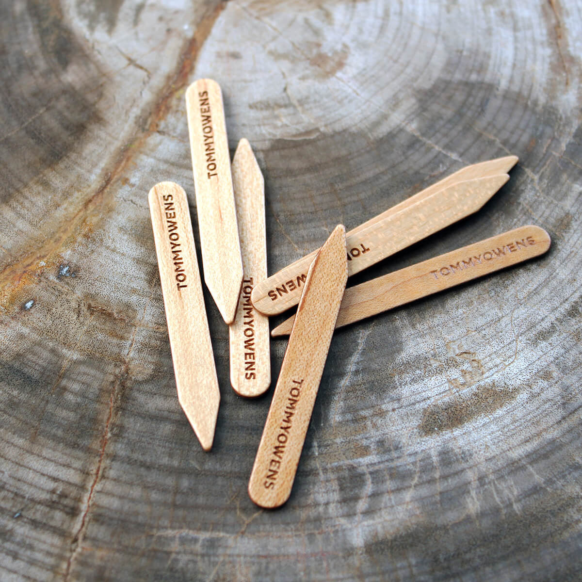 Classic maple wood collar stays neatly arranged, showcasing their light, natural finish and smooth texture.