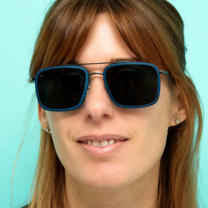 women wearing handcrafted blue wood sunglasses